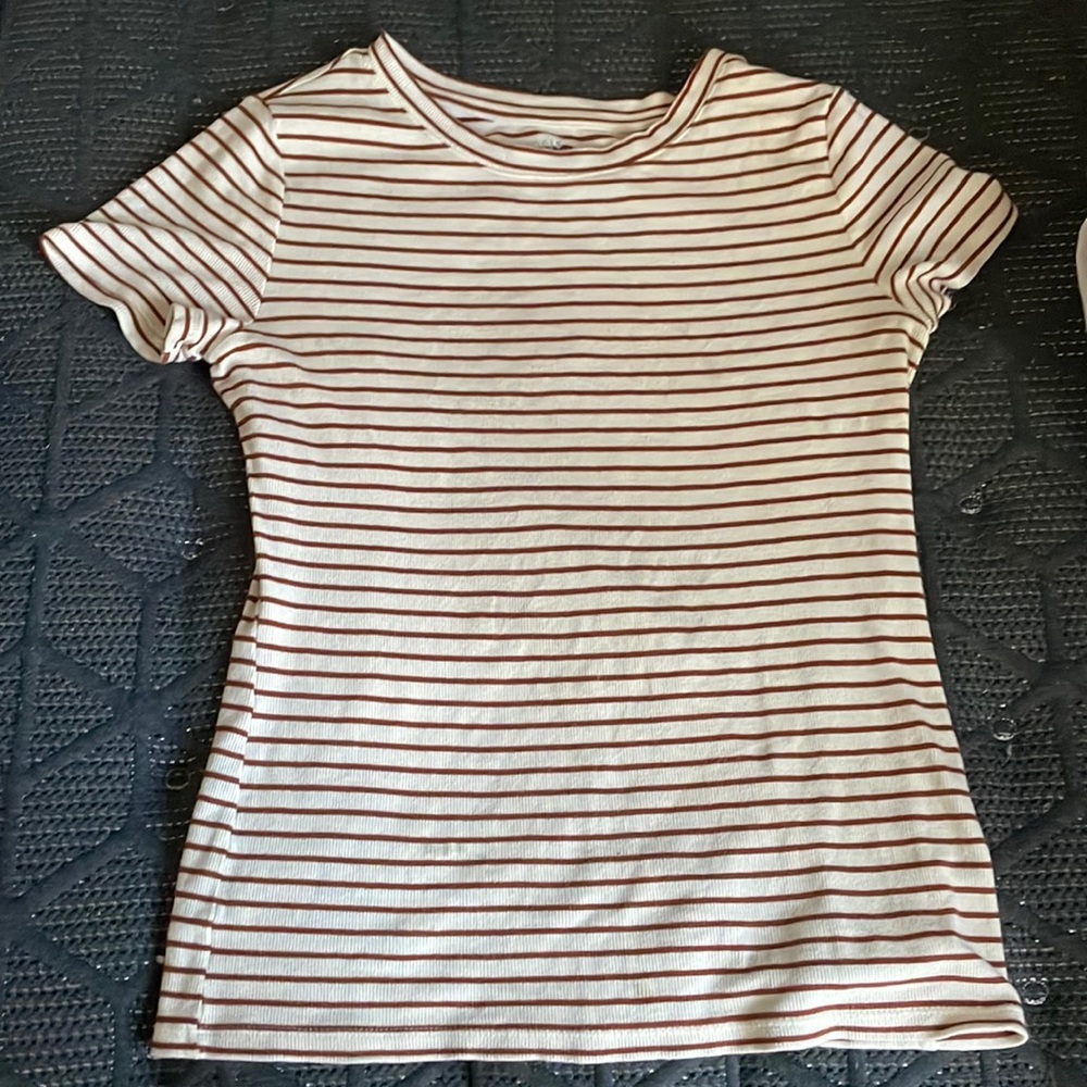 Stripped shirt.Brand: Time And Tru Size: small 4-6 Color: burnt orange and white